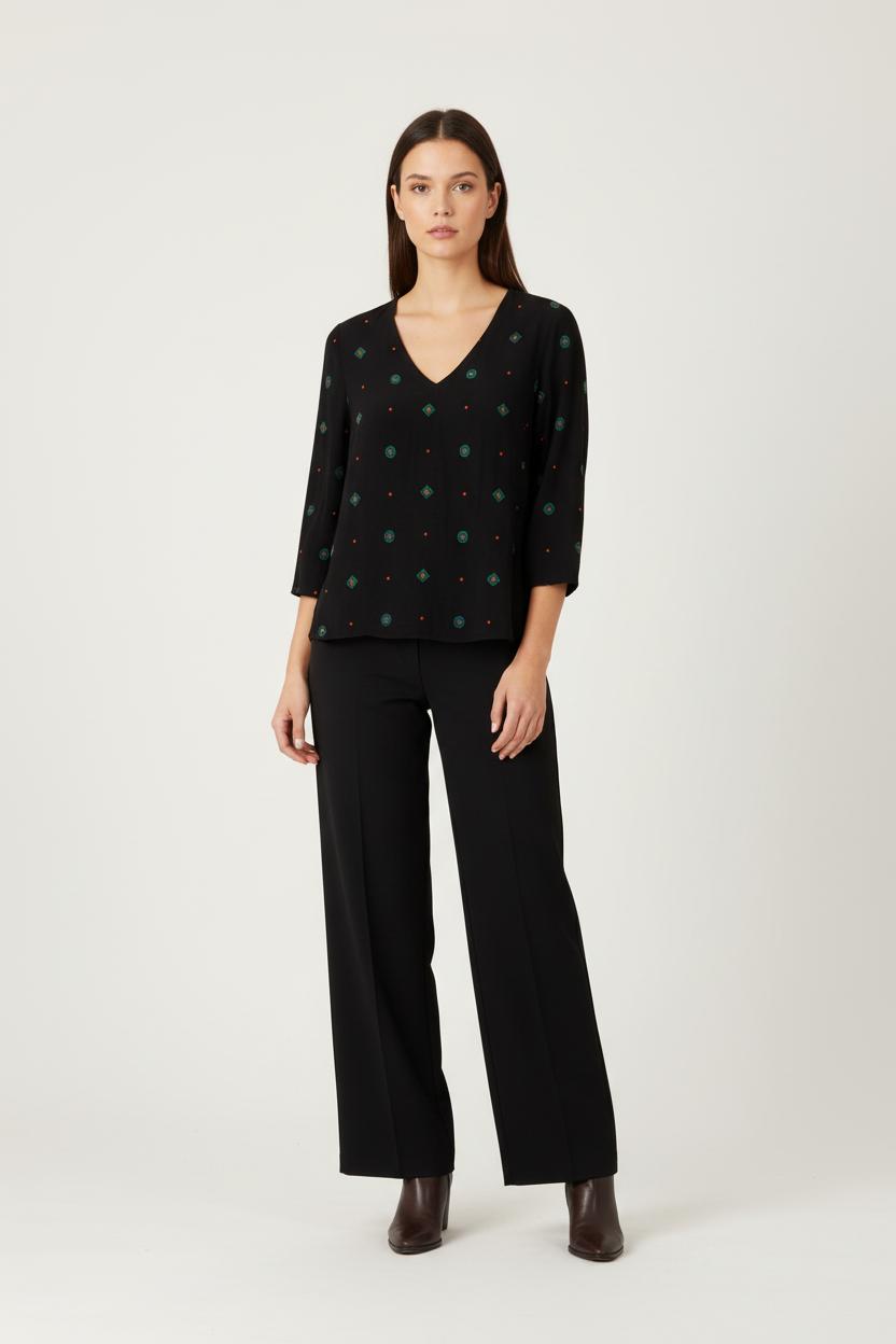 Blouse noire avec motifs orange, bleu et vert - Taille S/36