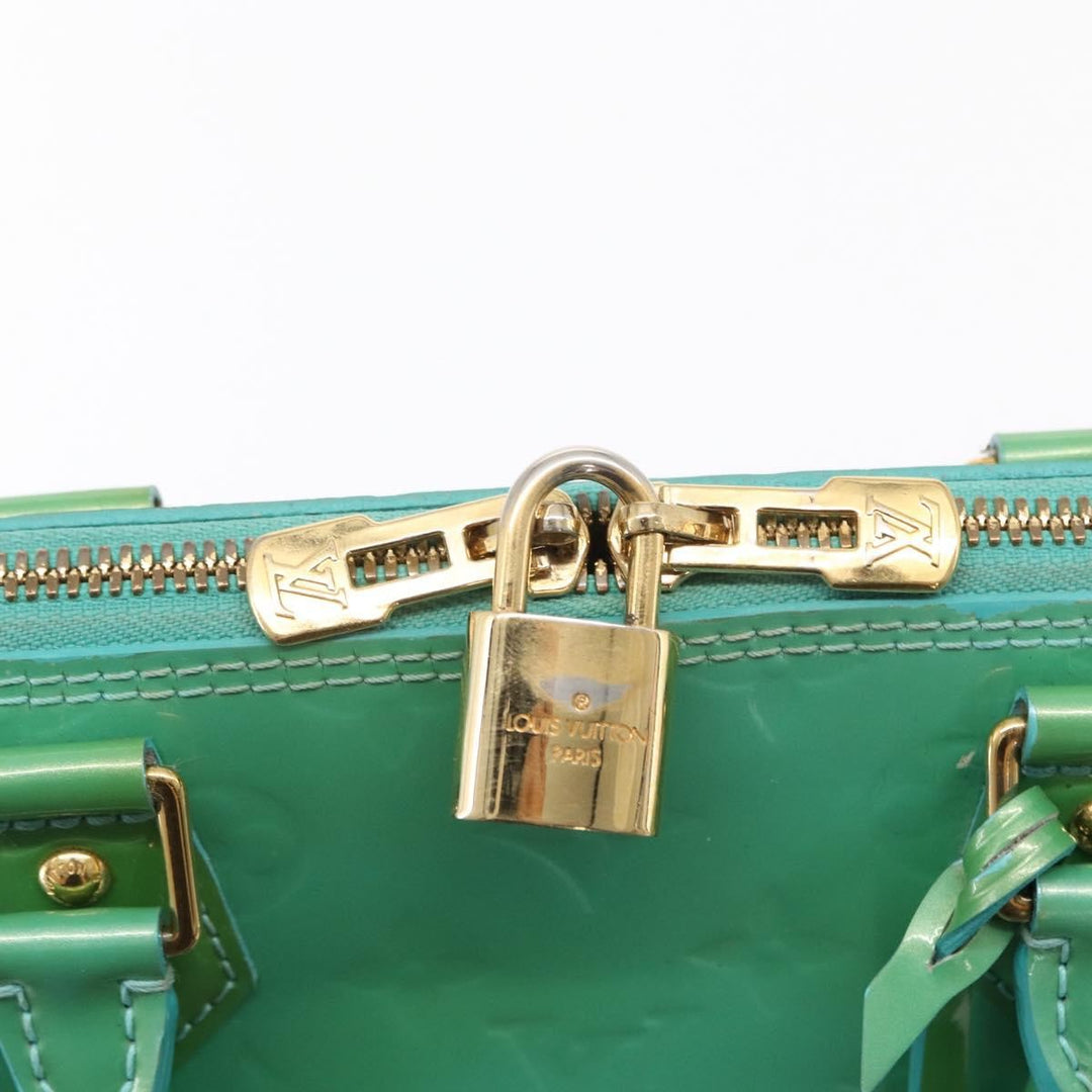 Louis Vuitton Alma Handbag Patent Leather